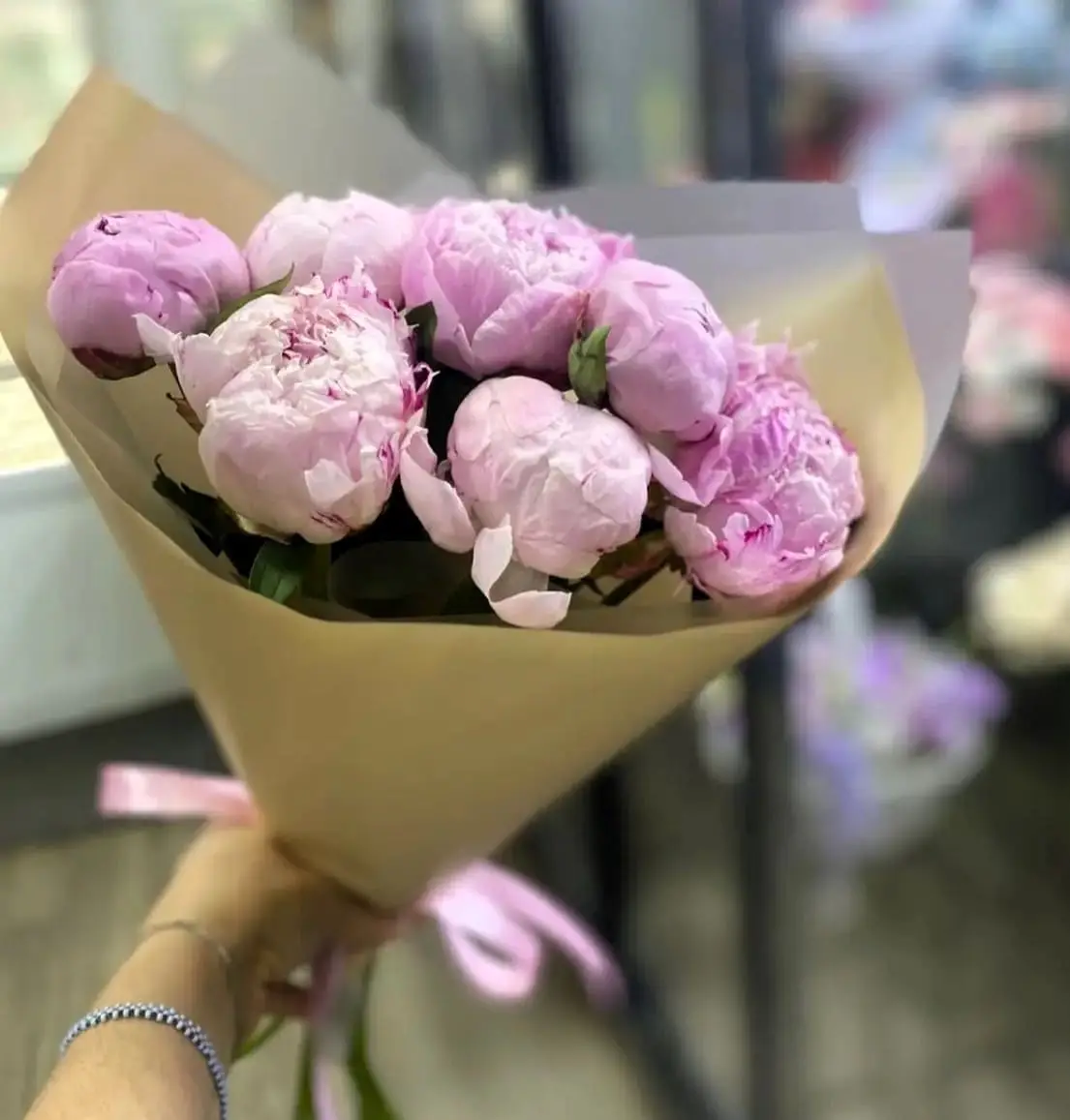 Букет из 9 розовых пионов 